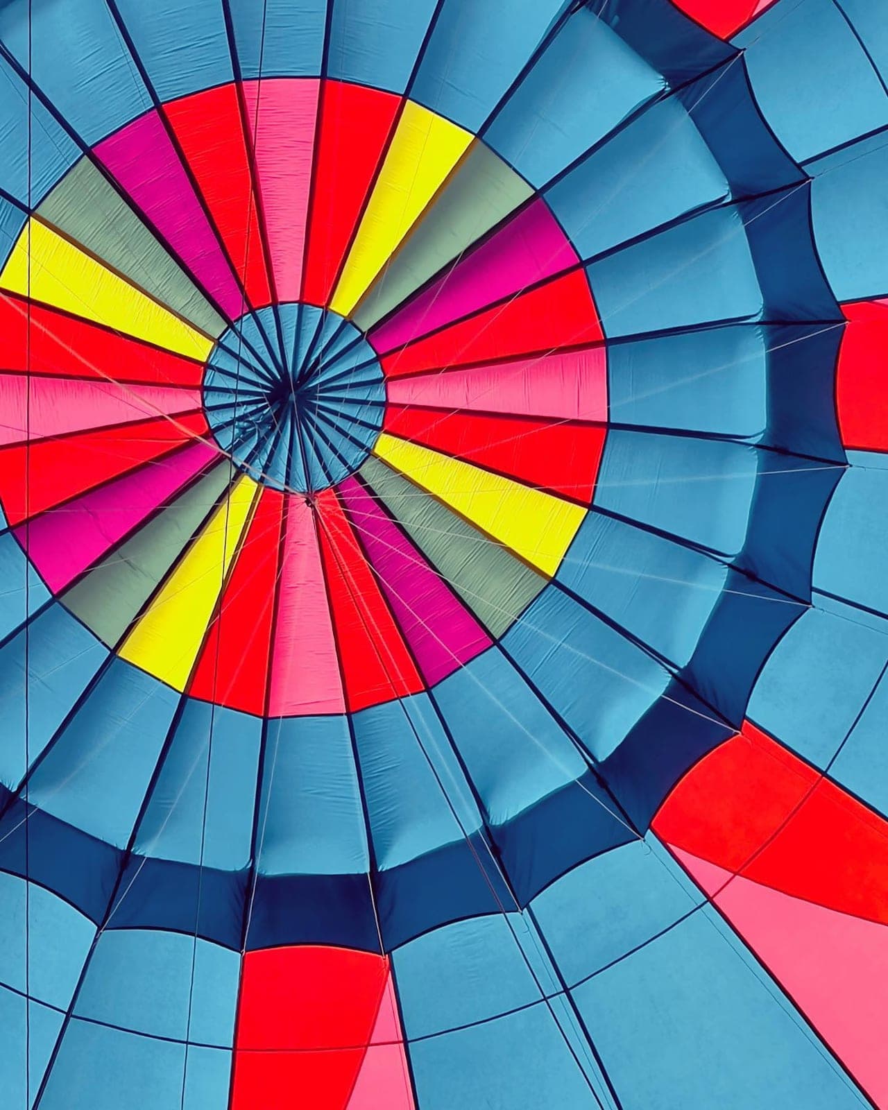 The canopy of a hot air balloon seen from below